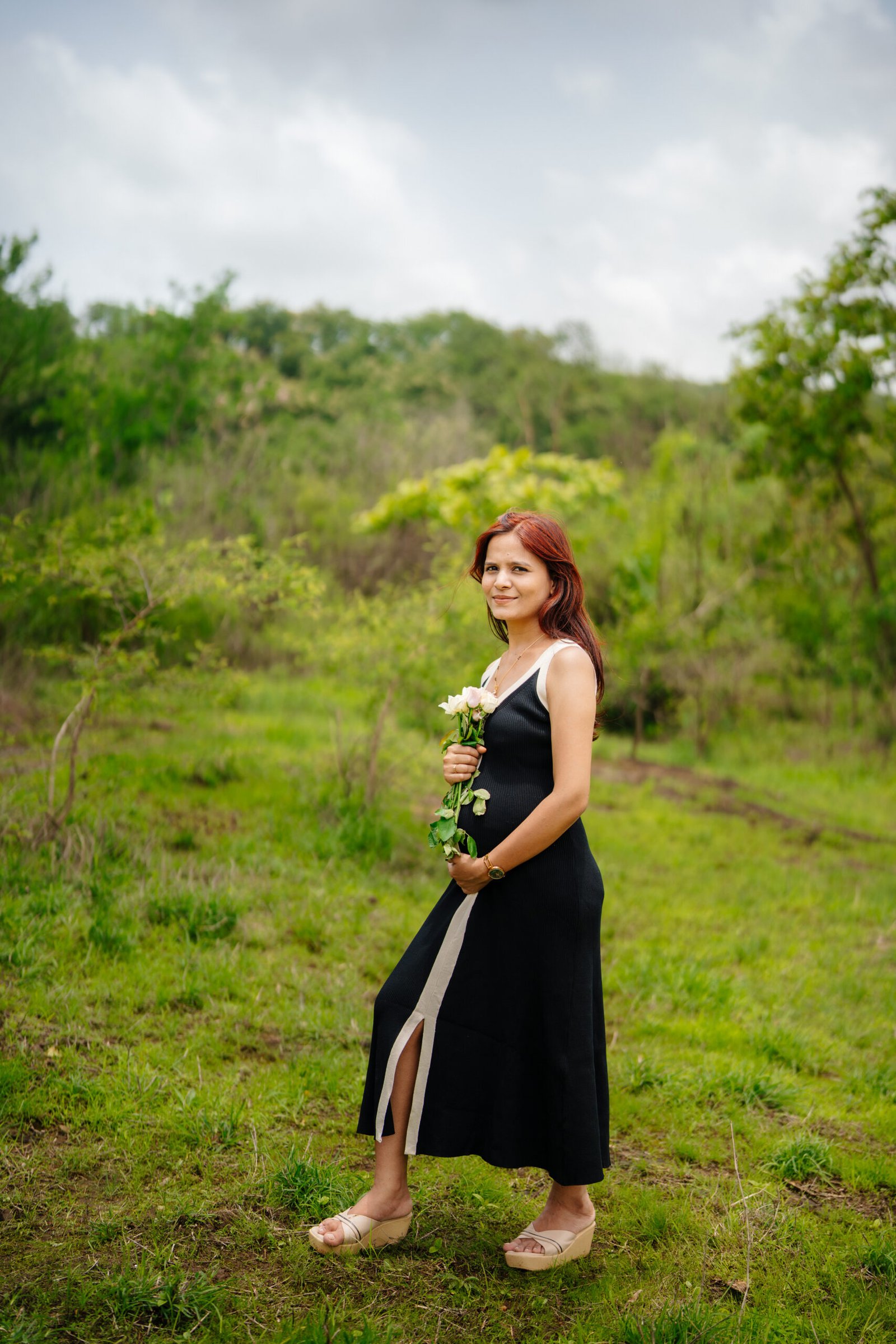 Maternity photoshoot Wagholi — elegant studio portrait